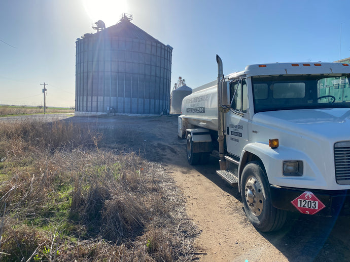 Fuel delivery with Coffey Grain in background.