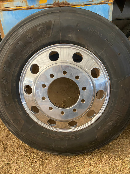 Aluminum wheel with brand new 24.5 Firestone steer tire.